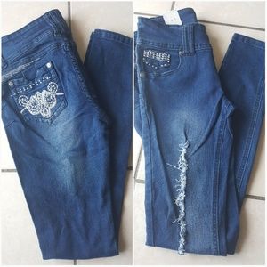 Blue distressed denim jeans